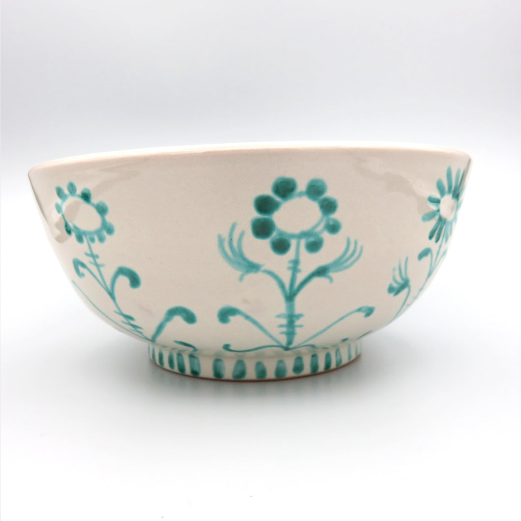 Ceramica artigianale abruzzese, decoro floreale dipinto a mano con verderame